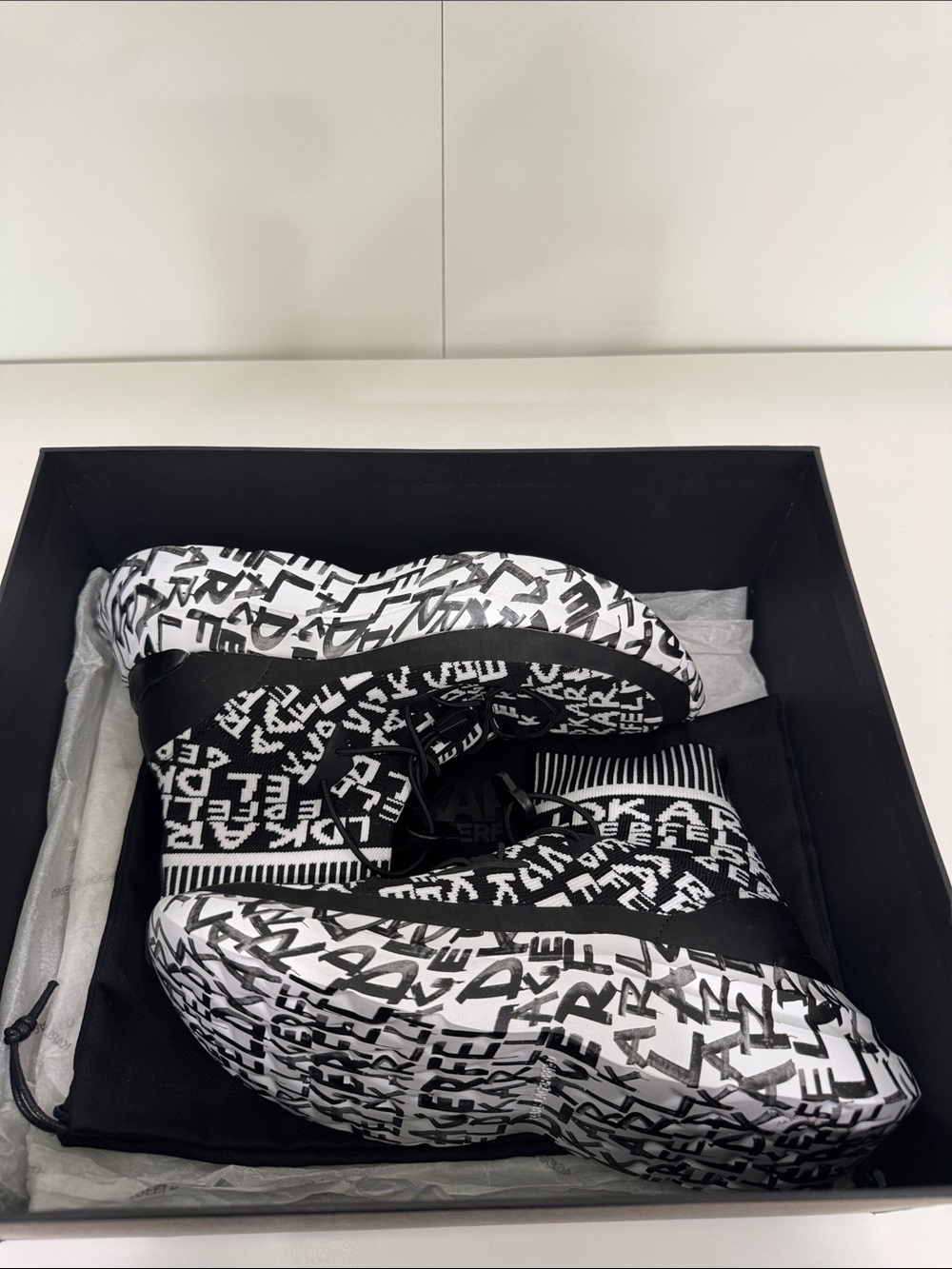 Karl Lagerfeld Black and White Graffiti Knit Pull-On Sneakers